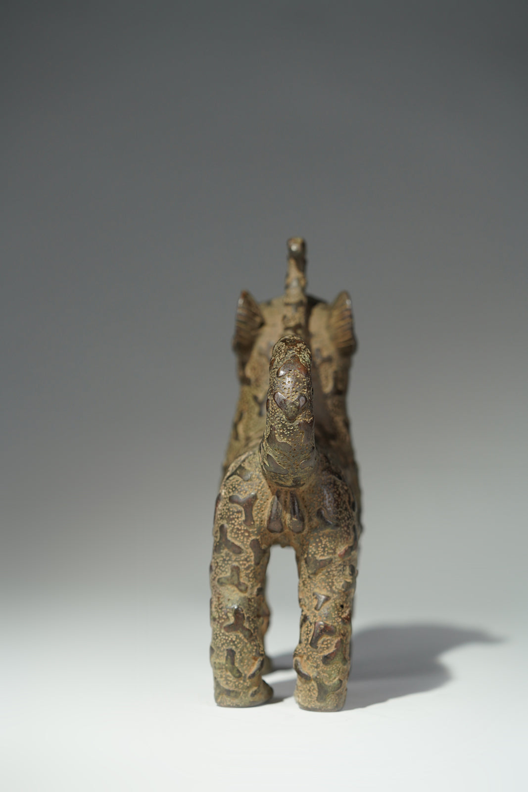 A couple bronze leopards