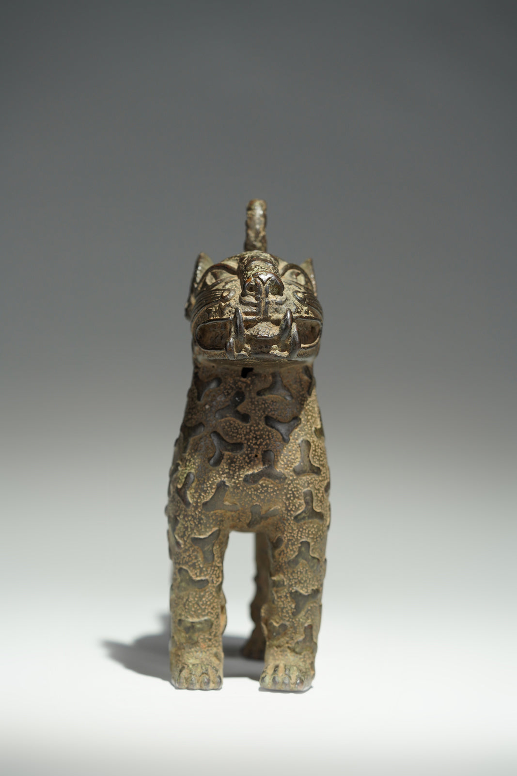 A couple bronze leopards