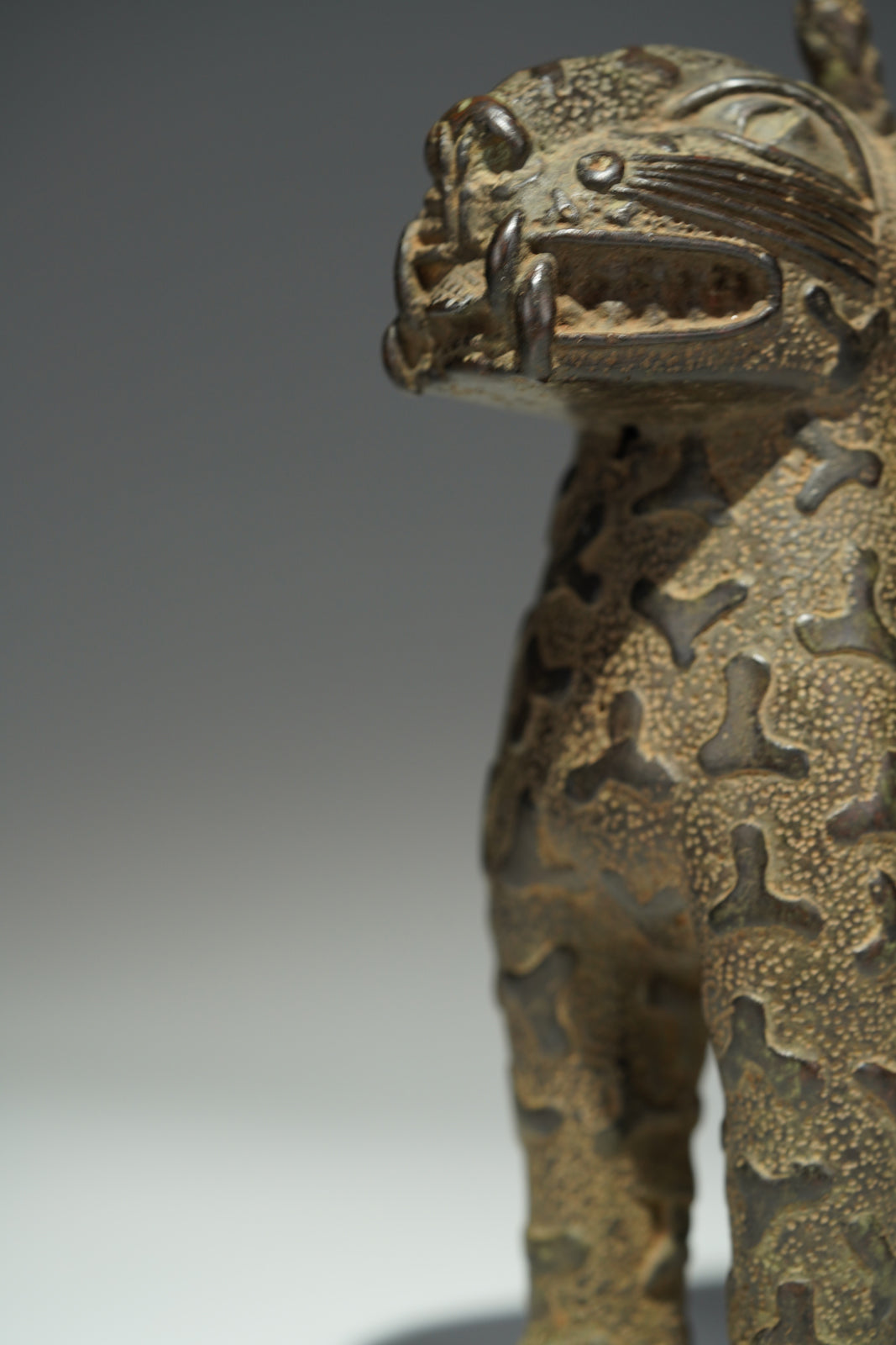 A couple bronze leopards
