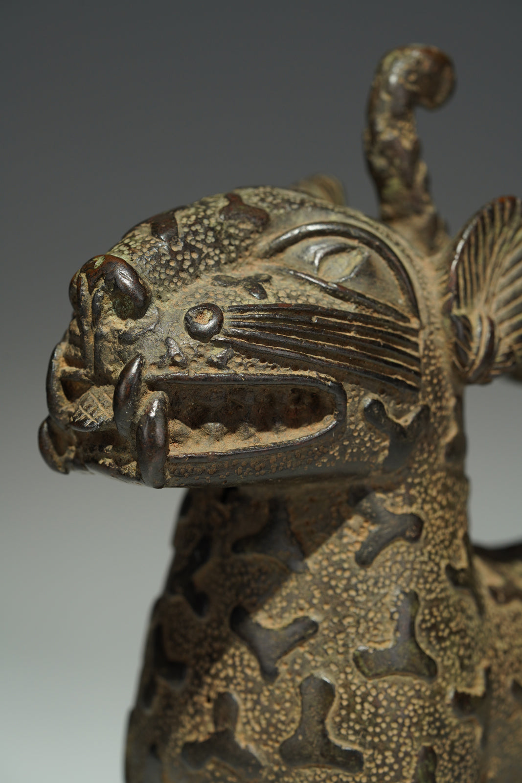 A couple bronze leopards