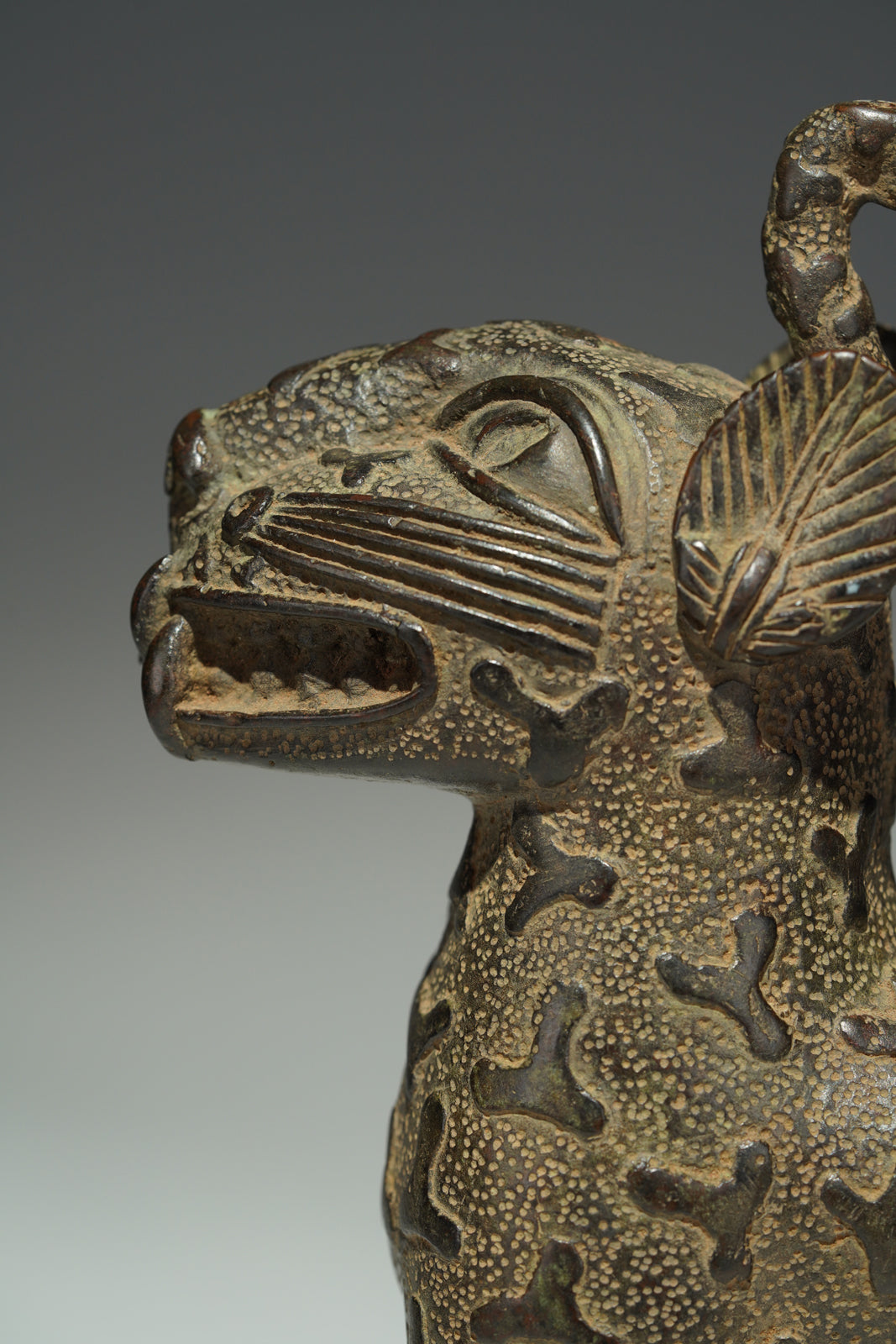A couple bronze leopards