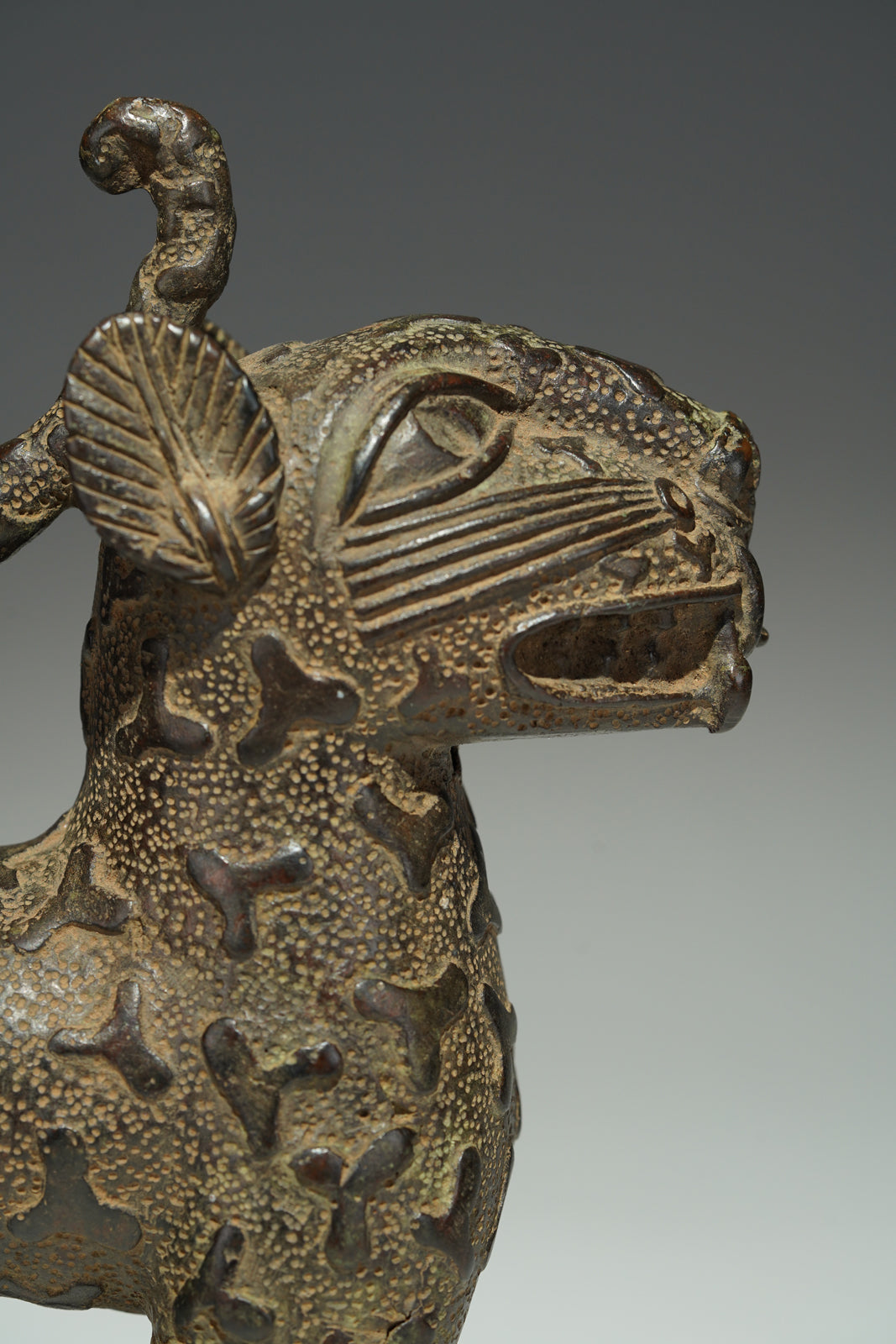 A couple bronze leopards
