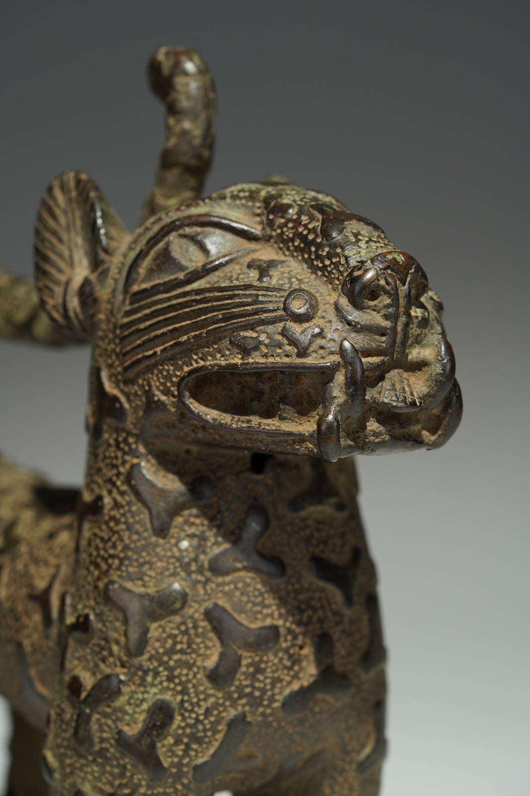A couple bronze leopards