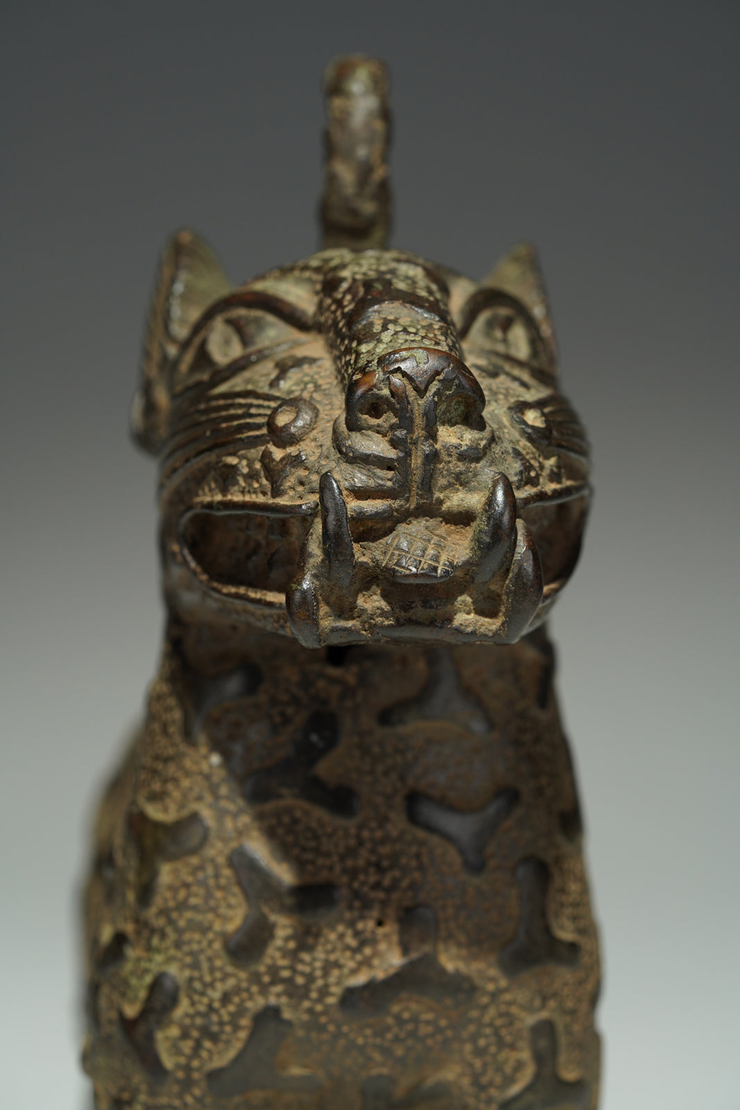 A couple bronze leopards