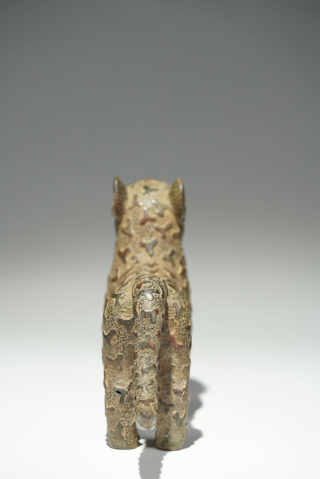 A couple bronze leopards