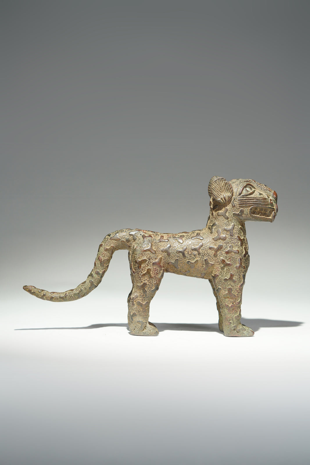 A couple bronze leopards