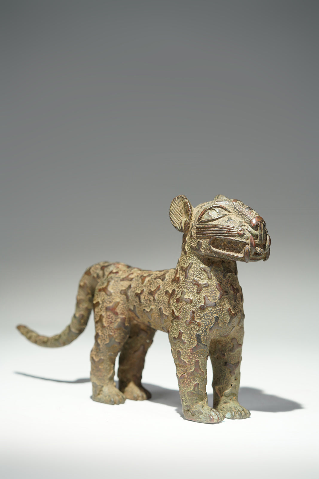 A couple bronze leopards