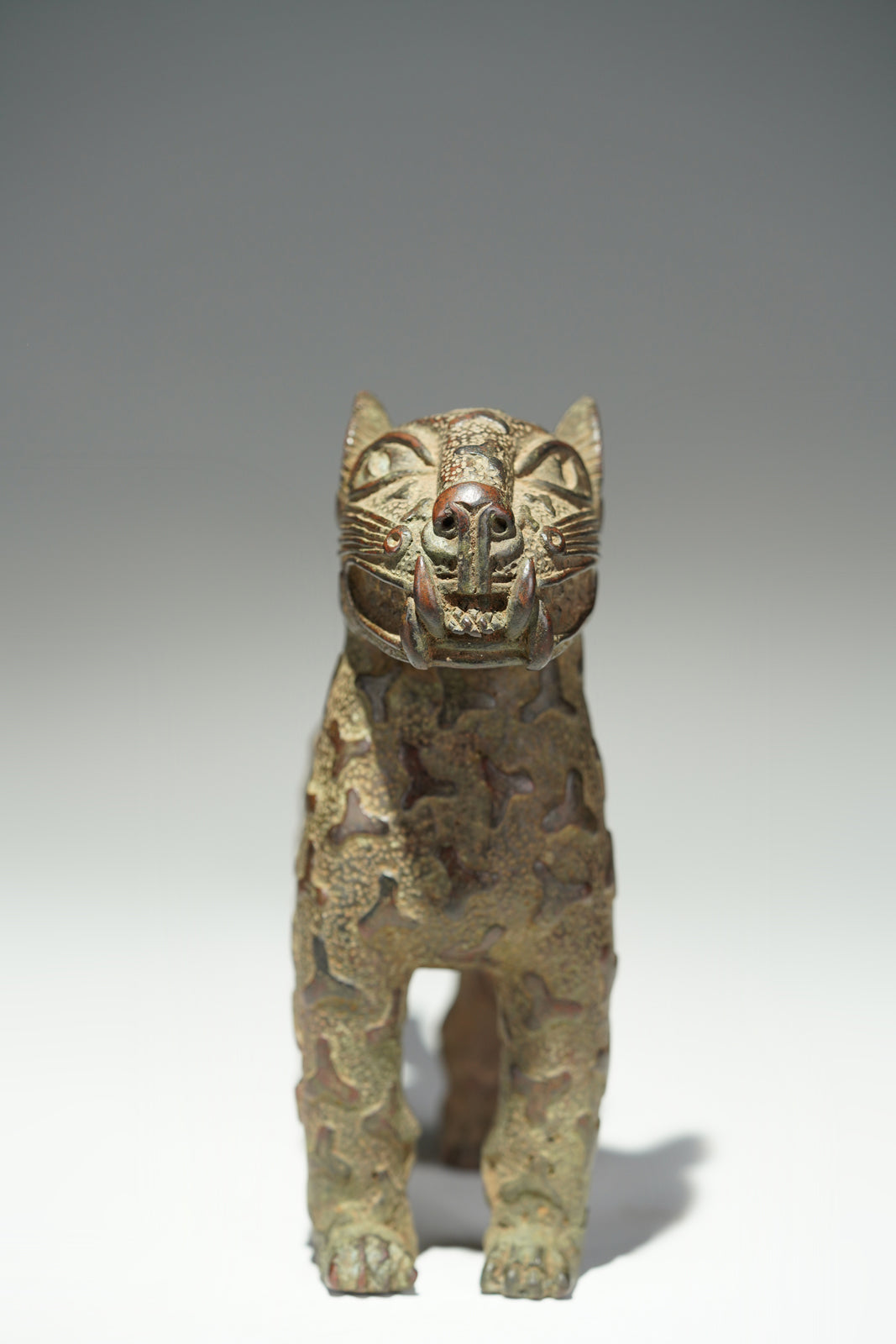 A couple bronze leopards