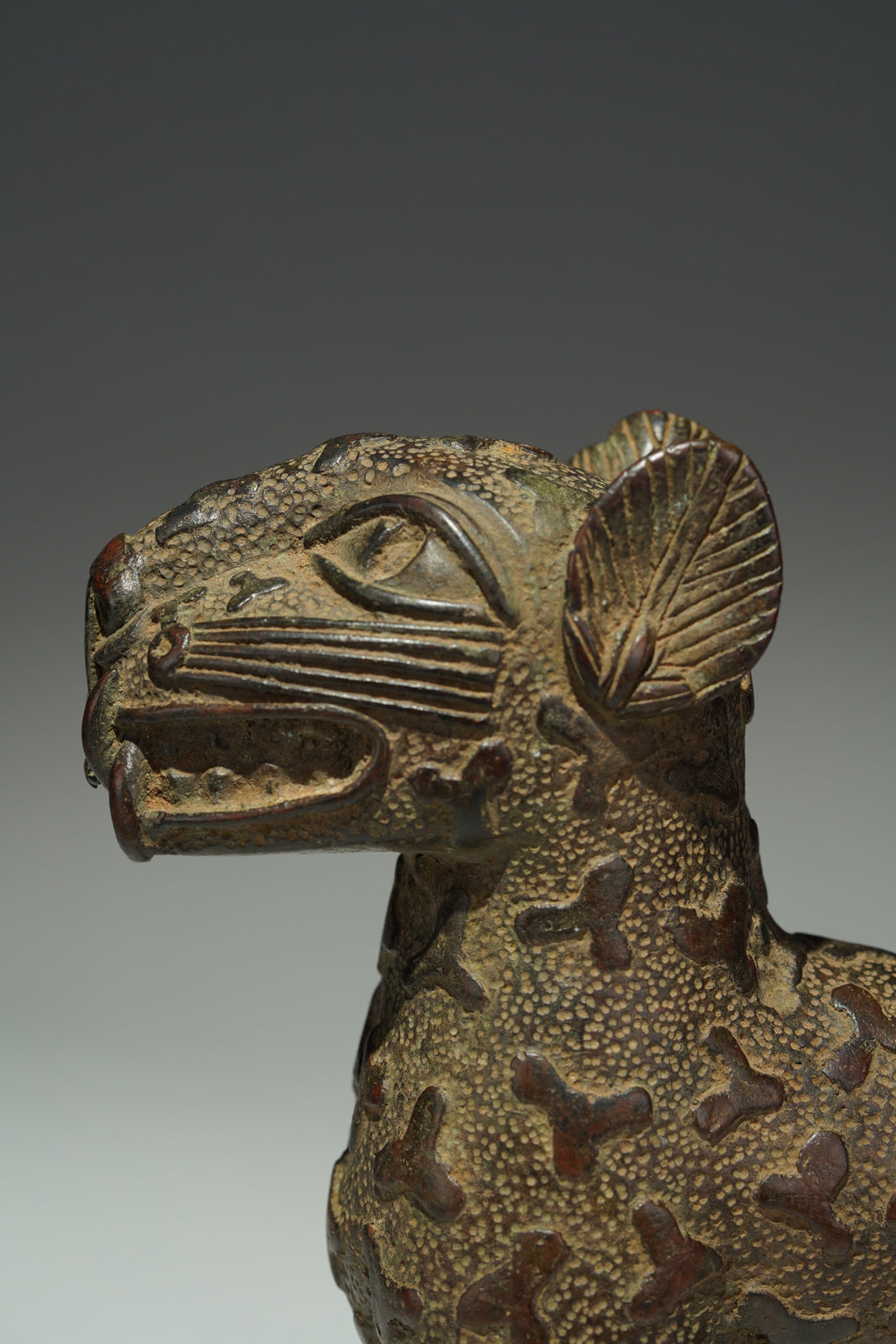 A couple bronze leopards