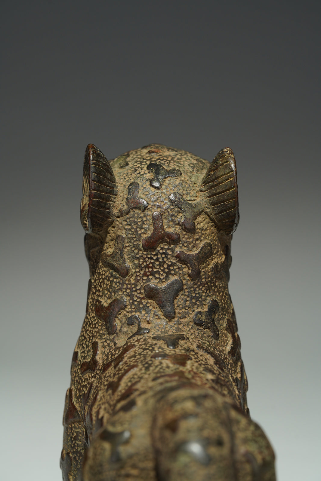 A couple bronze leopards