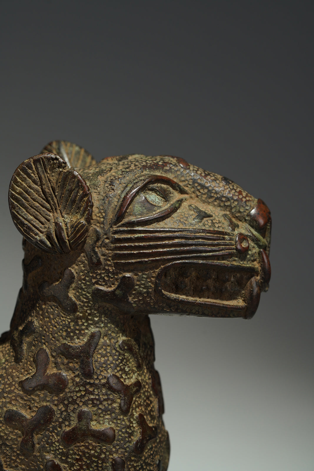 A couple bronze leopards