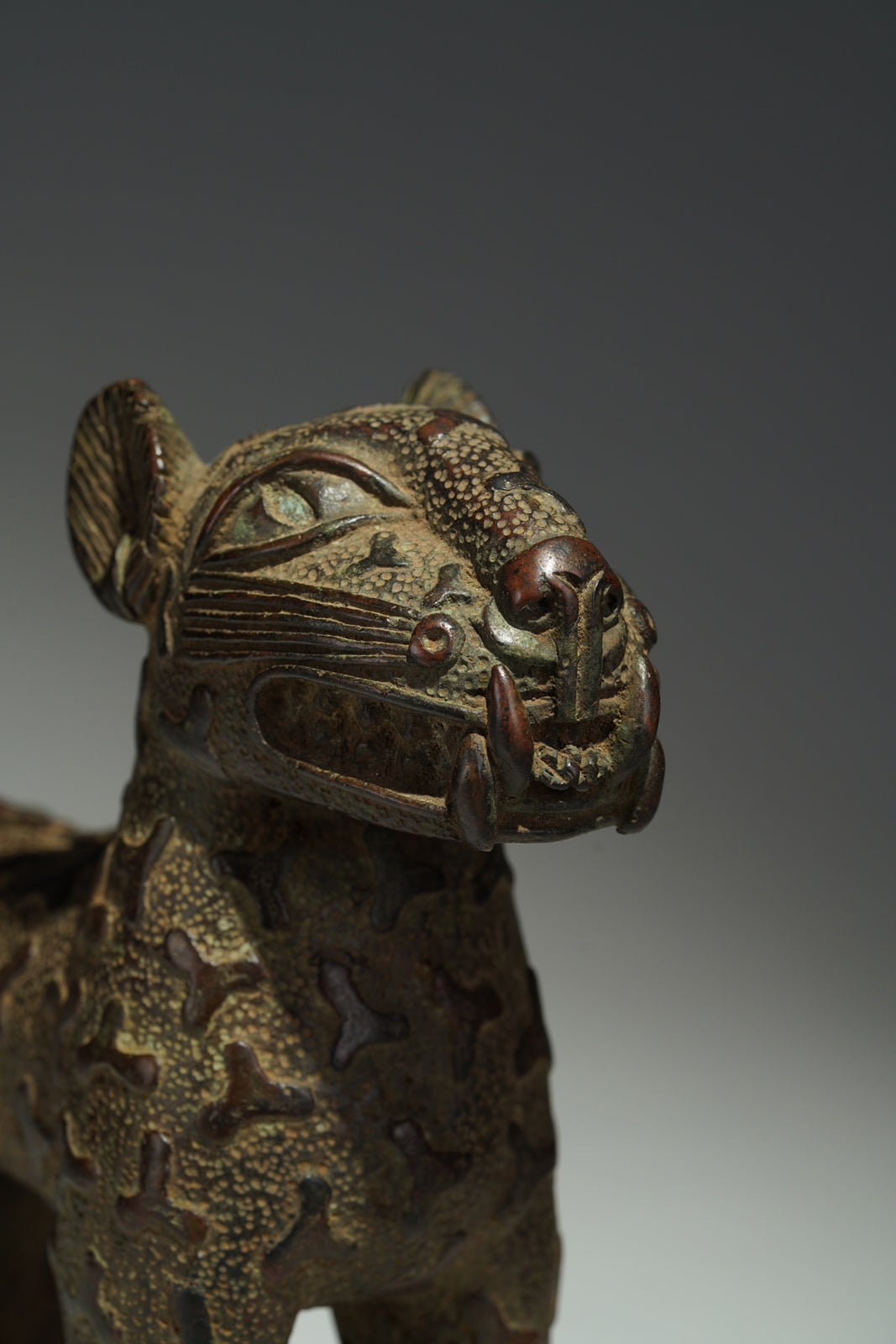 A couple bronze leopards