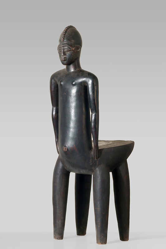 Lobi stool of athropomorphic shape