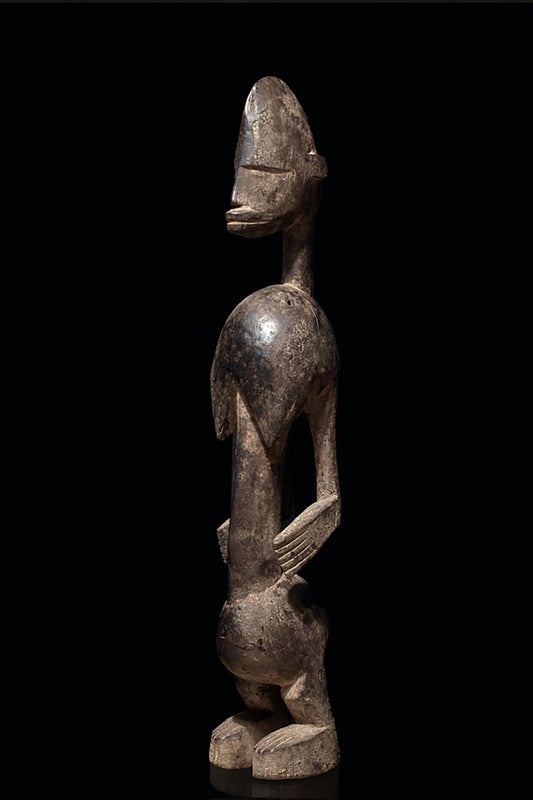 A female d'Jonka ancestor figure