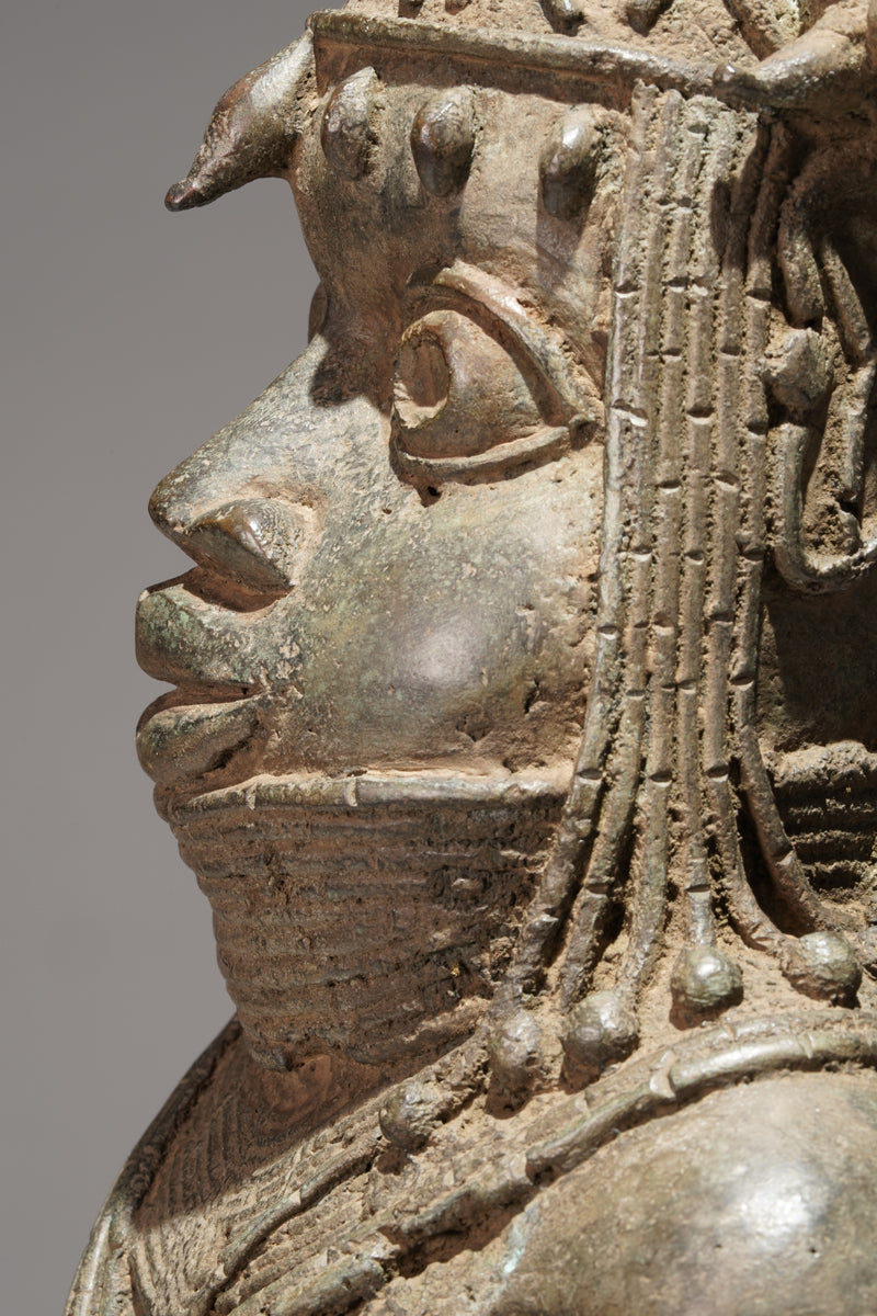 A bronze statue of an Oba in the Benin style