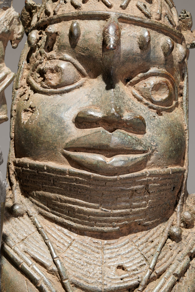 A bronze statue of an Oba in the Benin style