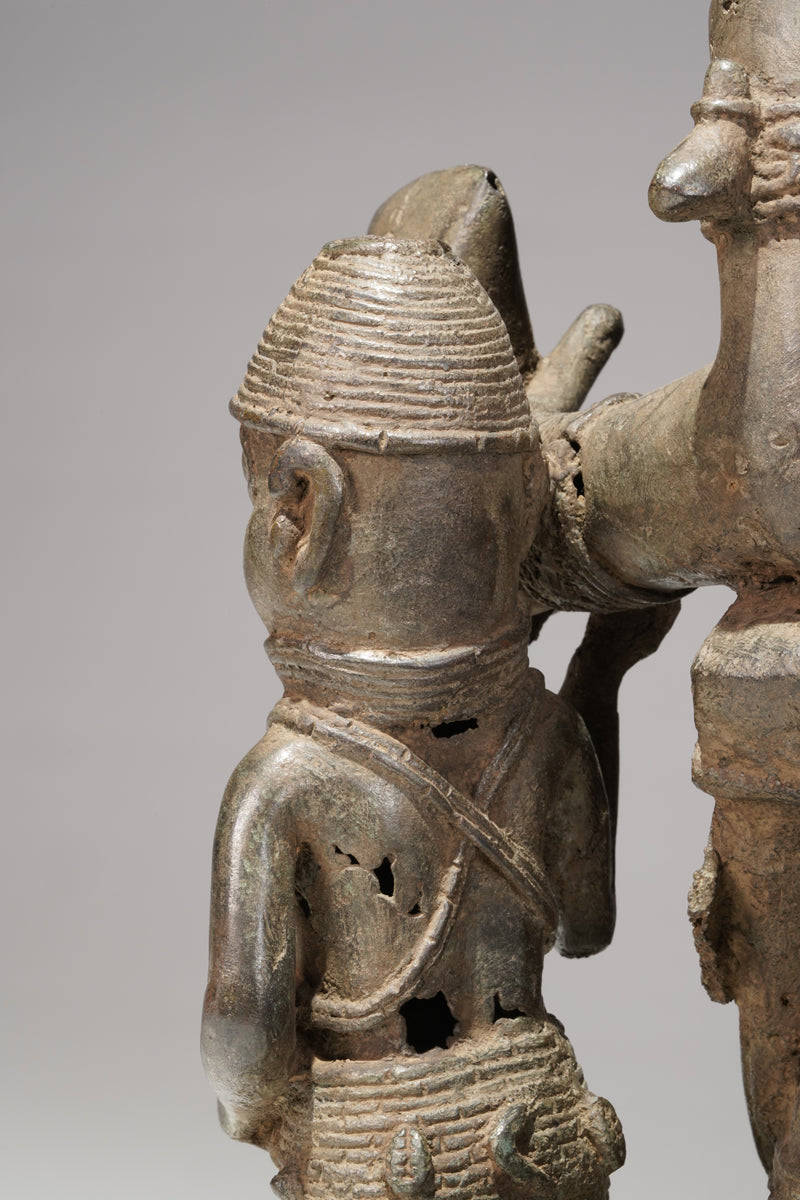 A bronze statue of an Oba in the Benin style