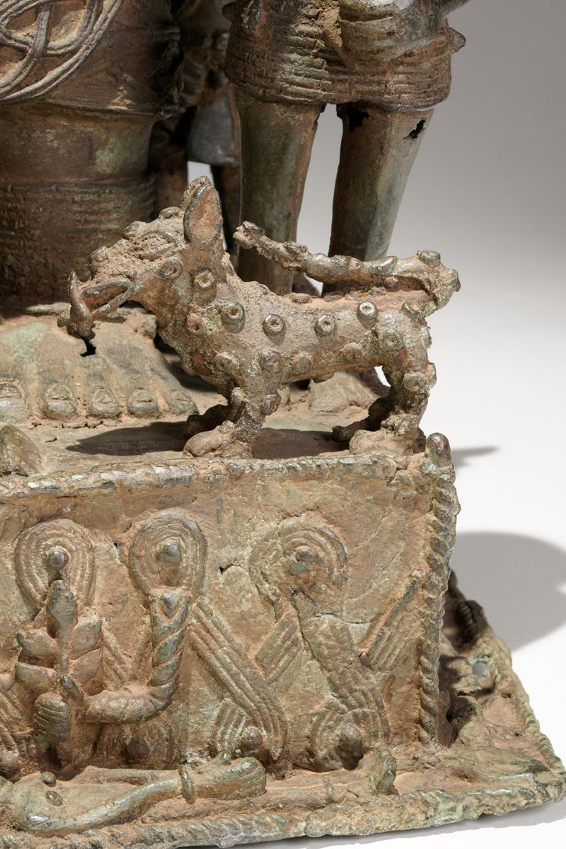 A bronze statue of an Oba in the Benin style