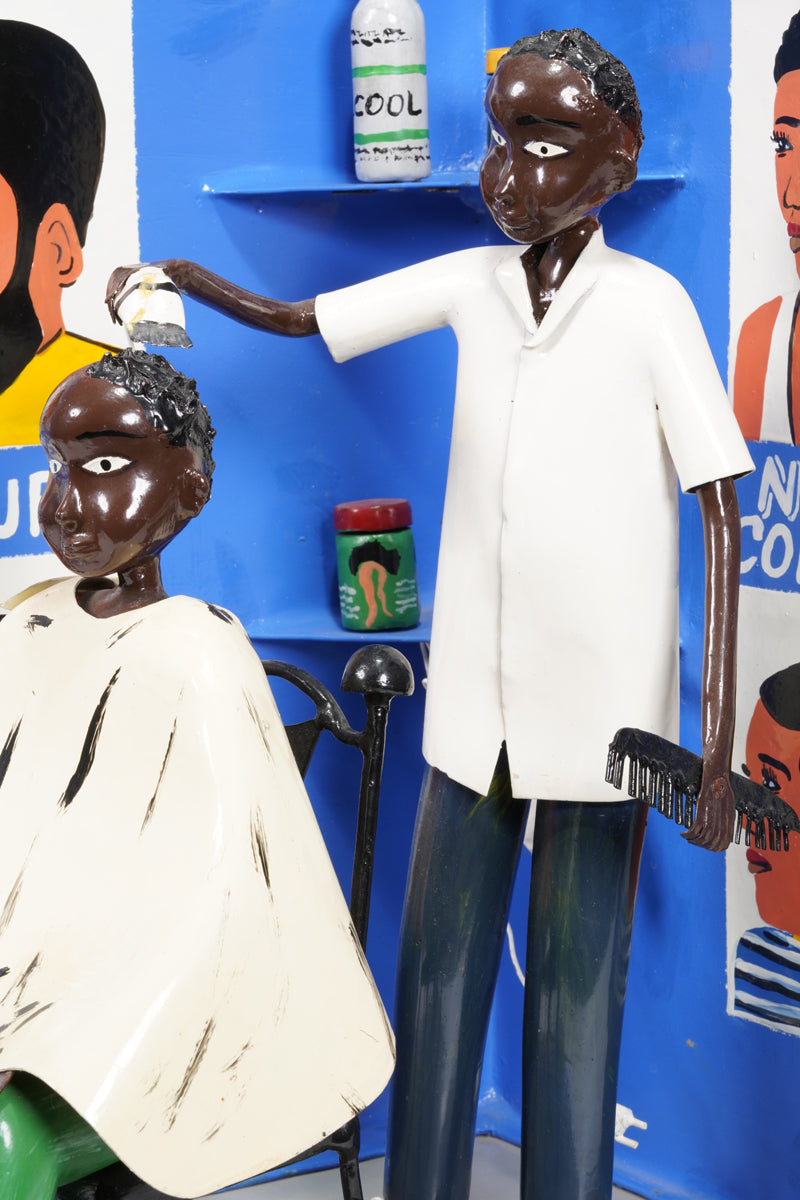 Barbershop scene where a customer sits