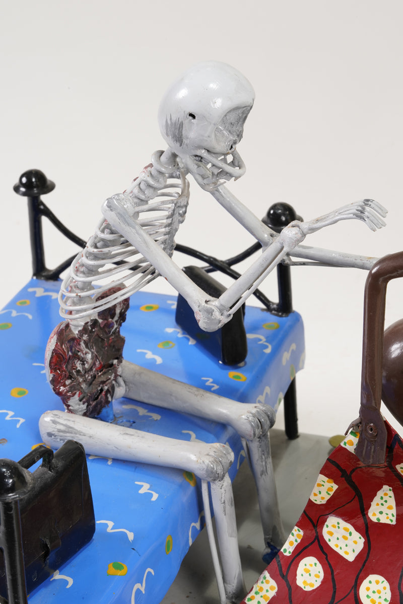 A scene of a brothel, with the guest seated on the bed represented as a skeleton