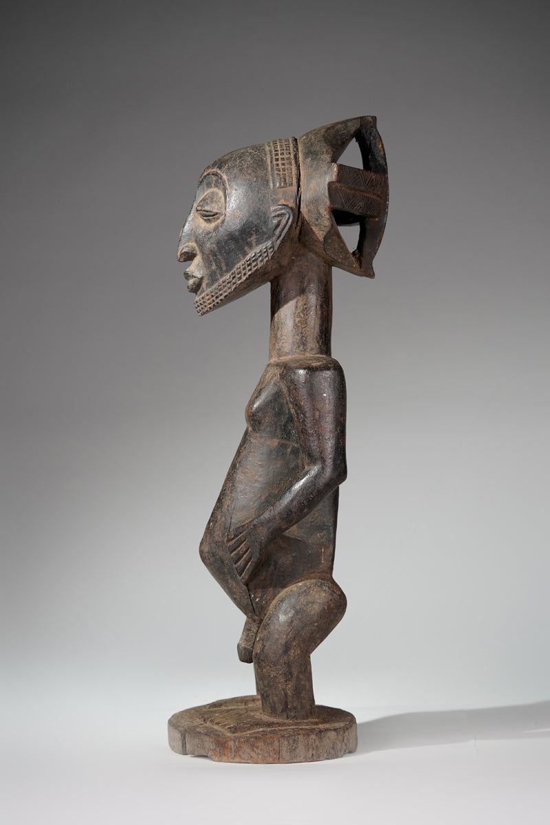 A male Hemba sculpture