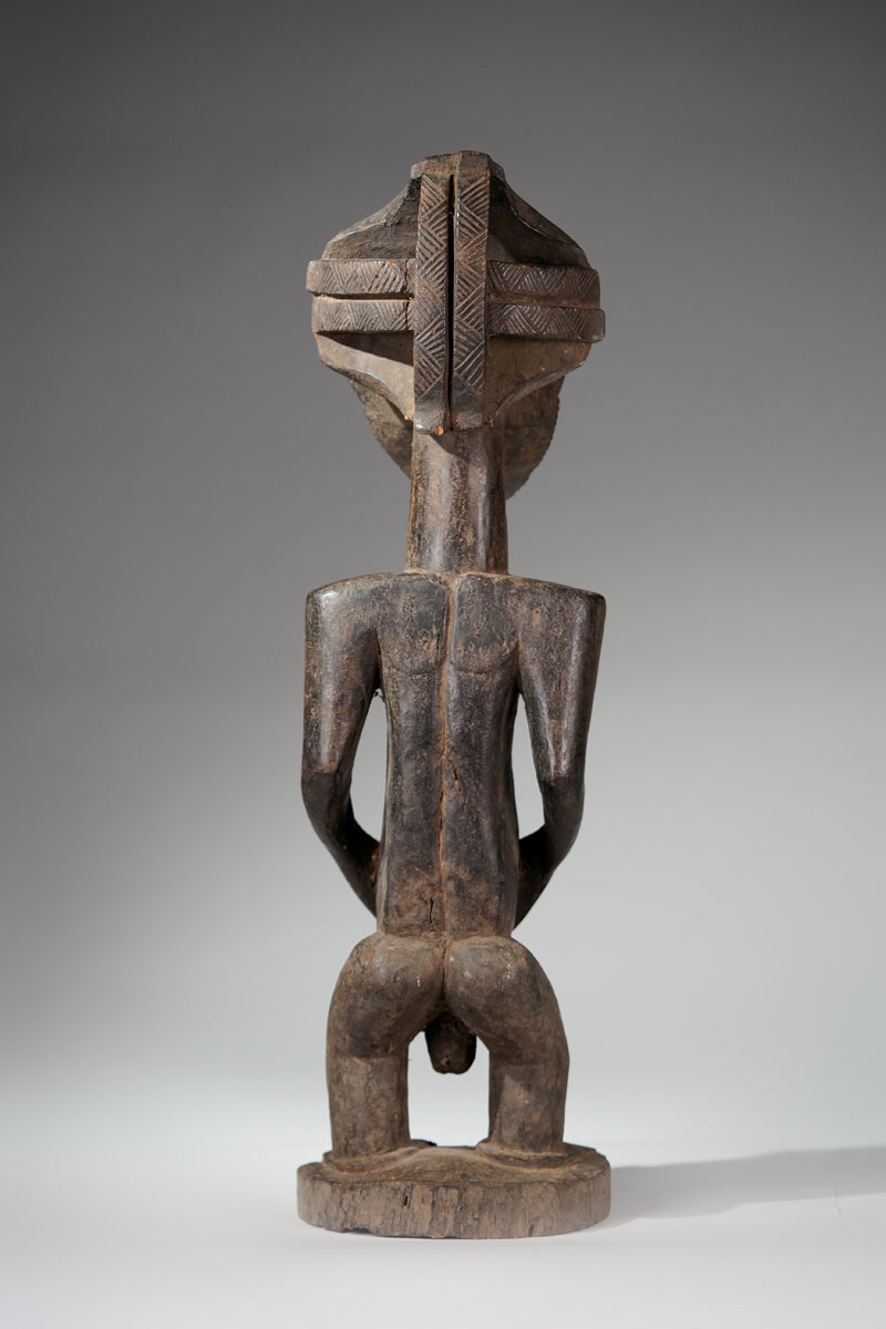 A male Hemba sculpture