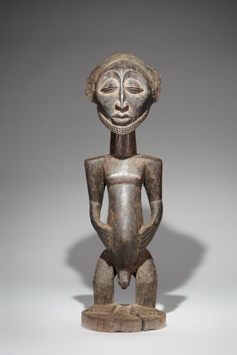 A male Hemba sculpture