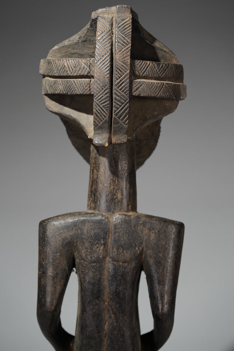 A male Hemba sculpture