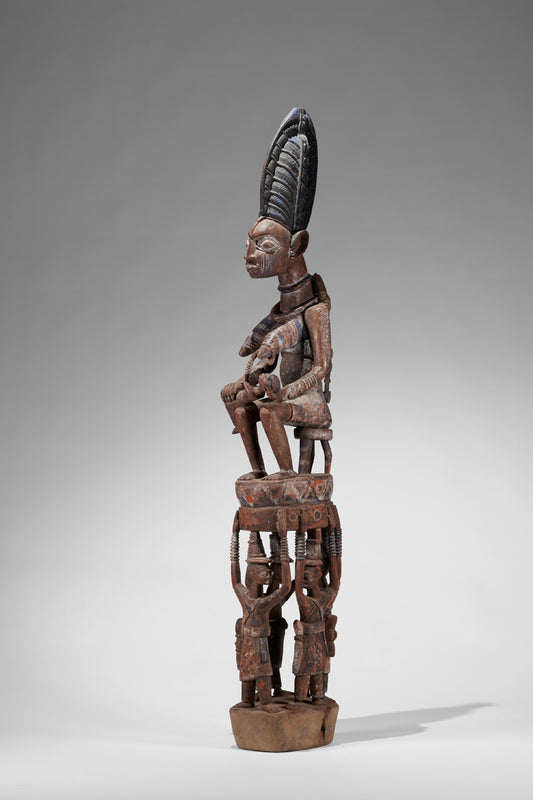 A Yoruba pole carving