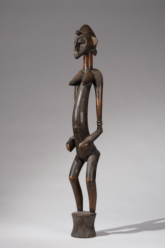 An outstanding female Senufo Déblé or guardian sculpture