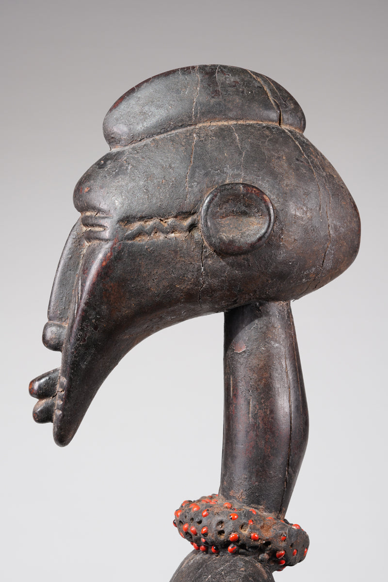 An outstanding female Senufo Rhythm pounder