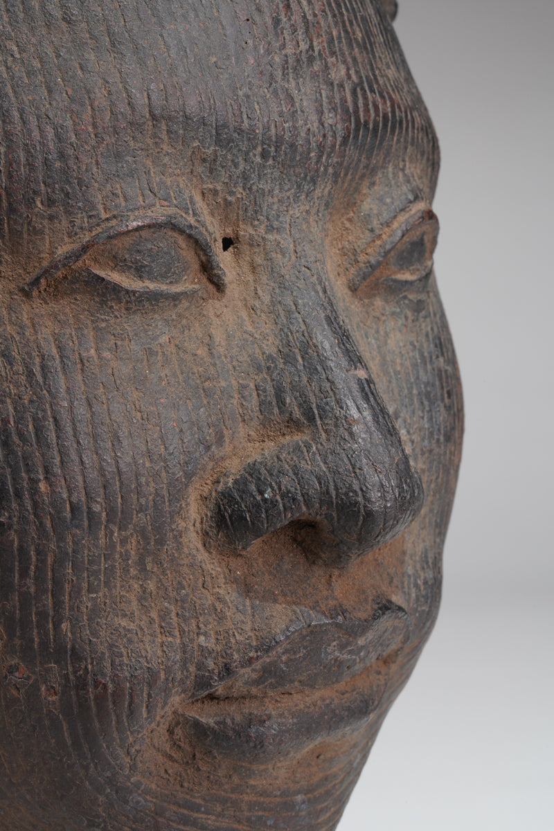 A head of Olokun in the style of Ife