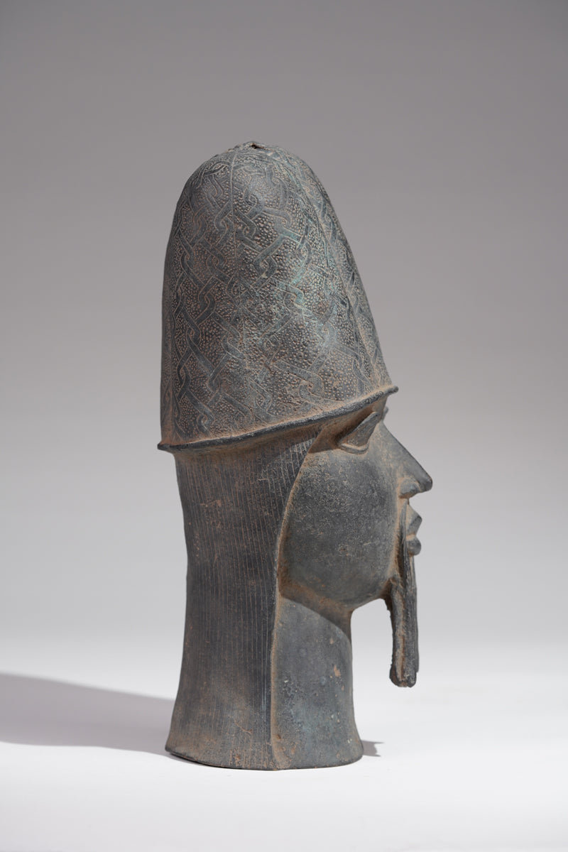 A Bronze head of a Portuguese in the style of Benin