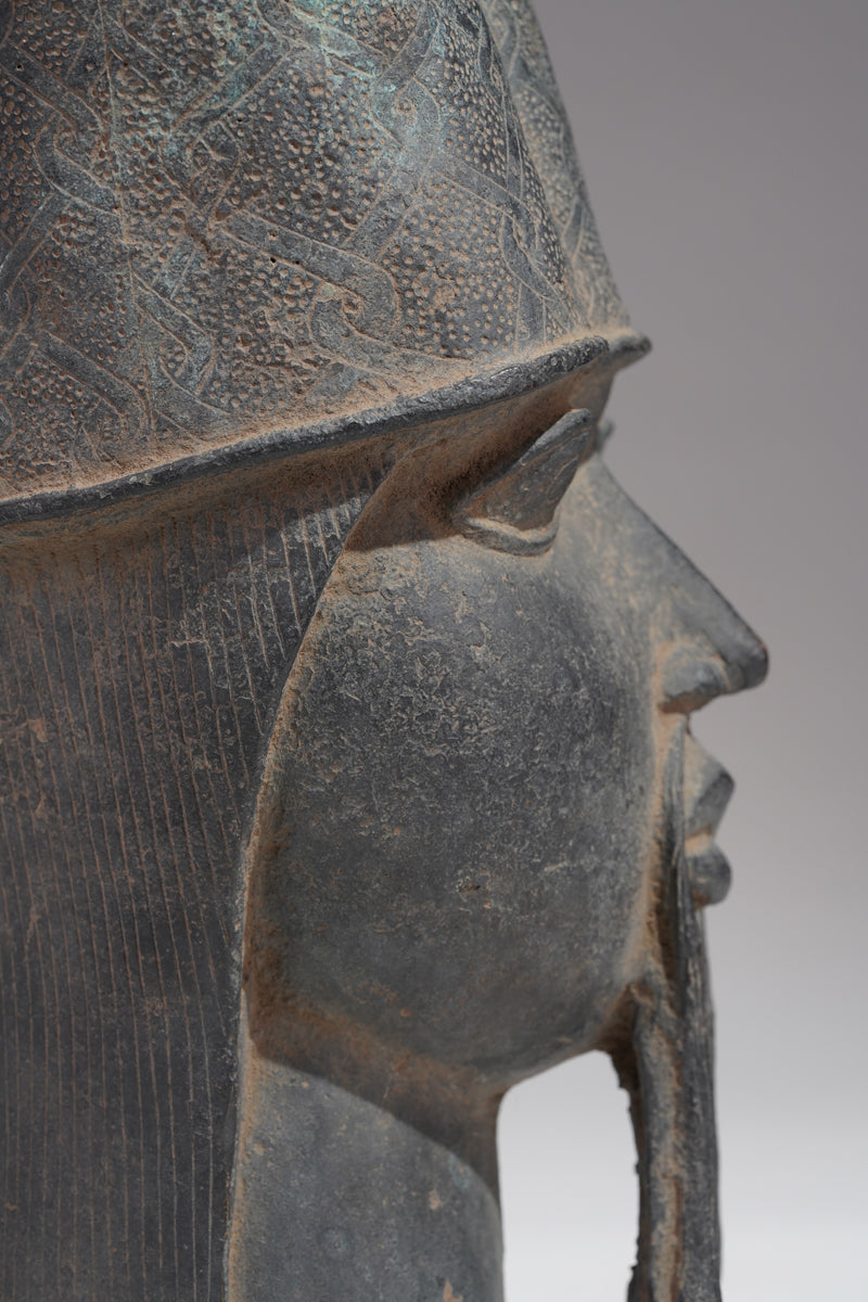 A Bronze head of a Portuguese in the style of Benin