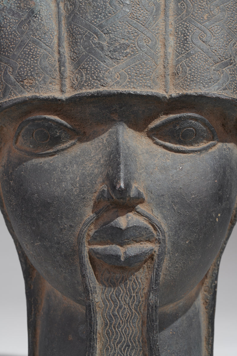 A Bronze head of a Portuguese in the style of Benin