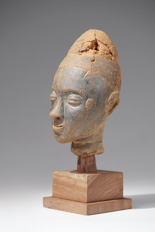 A fragmentary Akan terracotta funeral head