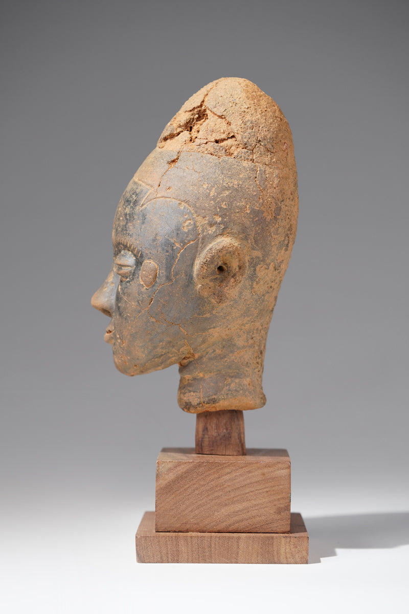 A fragmentary Akan terracotta funeral head