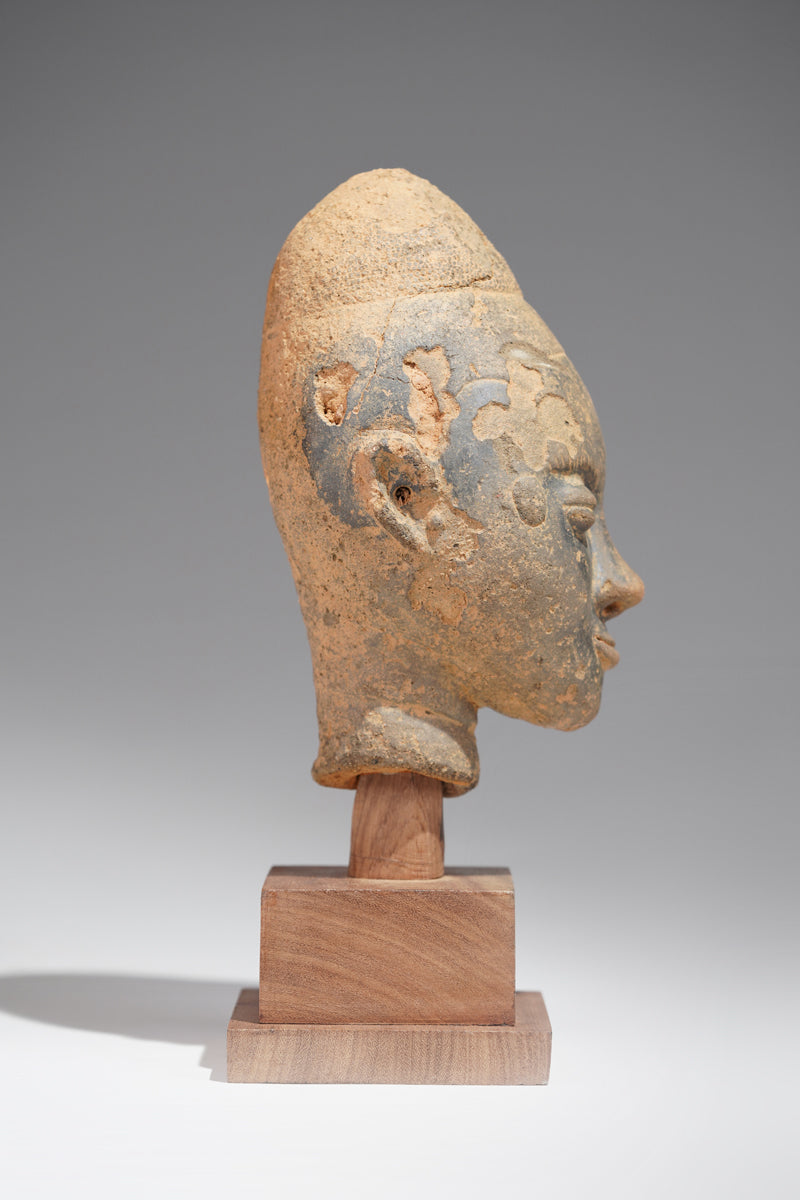 A fragmentary Akan terracotta funeral head