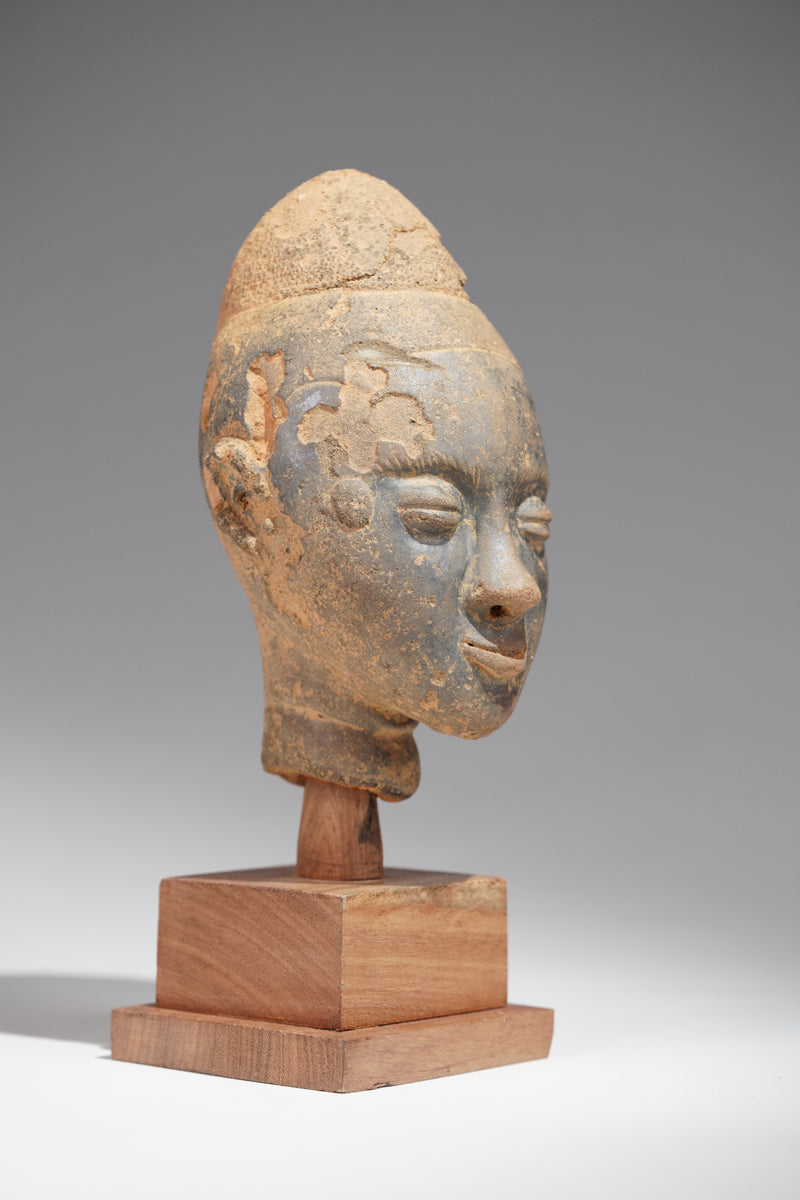 A fragmentary Akan terracotta funeral head