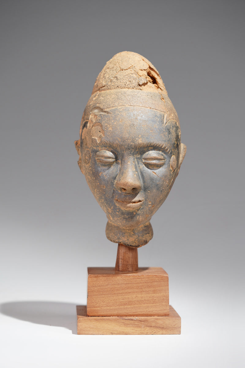 A fragmentary Akan terracotta funeral head