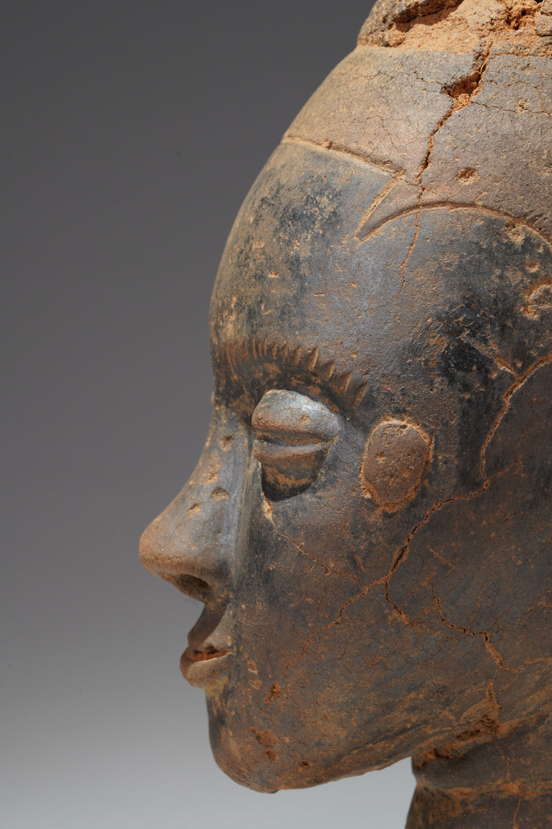 A fragmentary Akan terracotta funeral head