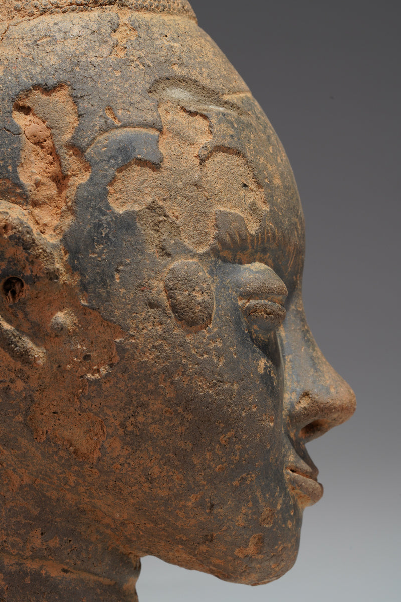 A fragmentary Akan terracotta funeral head