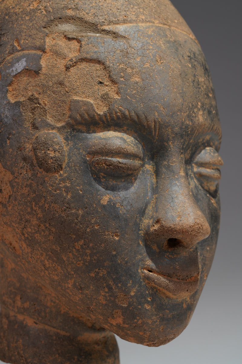 A fragmentary Akan terracotta funeral head