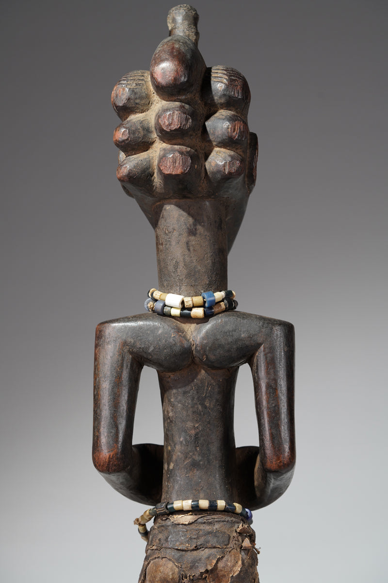 A female Songye sculpture