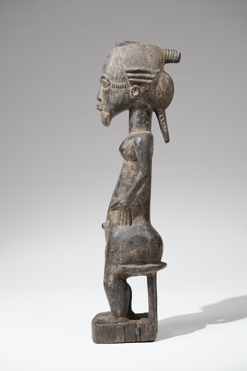 A Baule sculpture from the Mbahiakro region