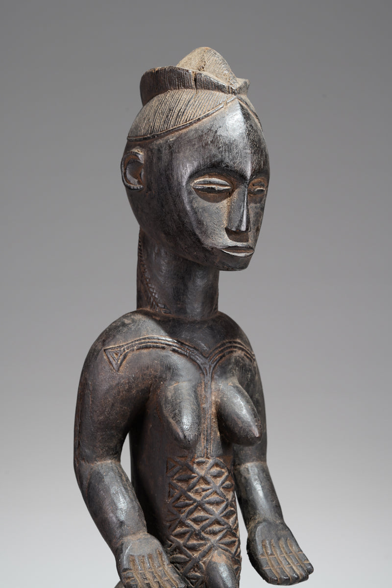 A female Bete sculpture from the Gagnoa region