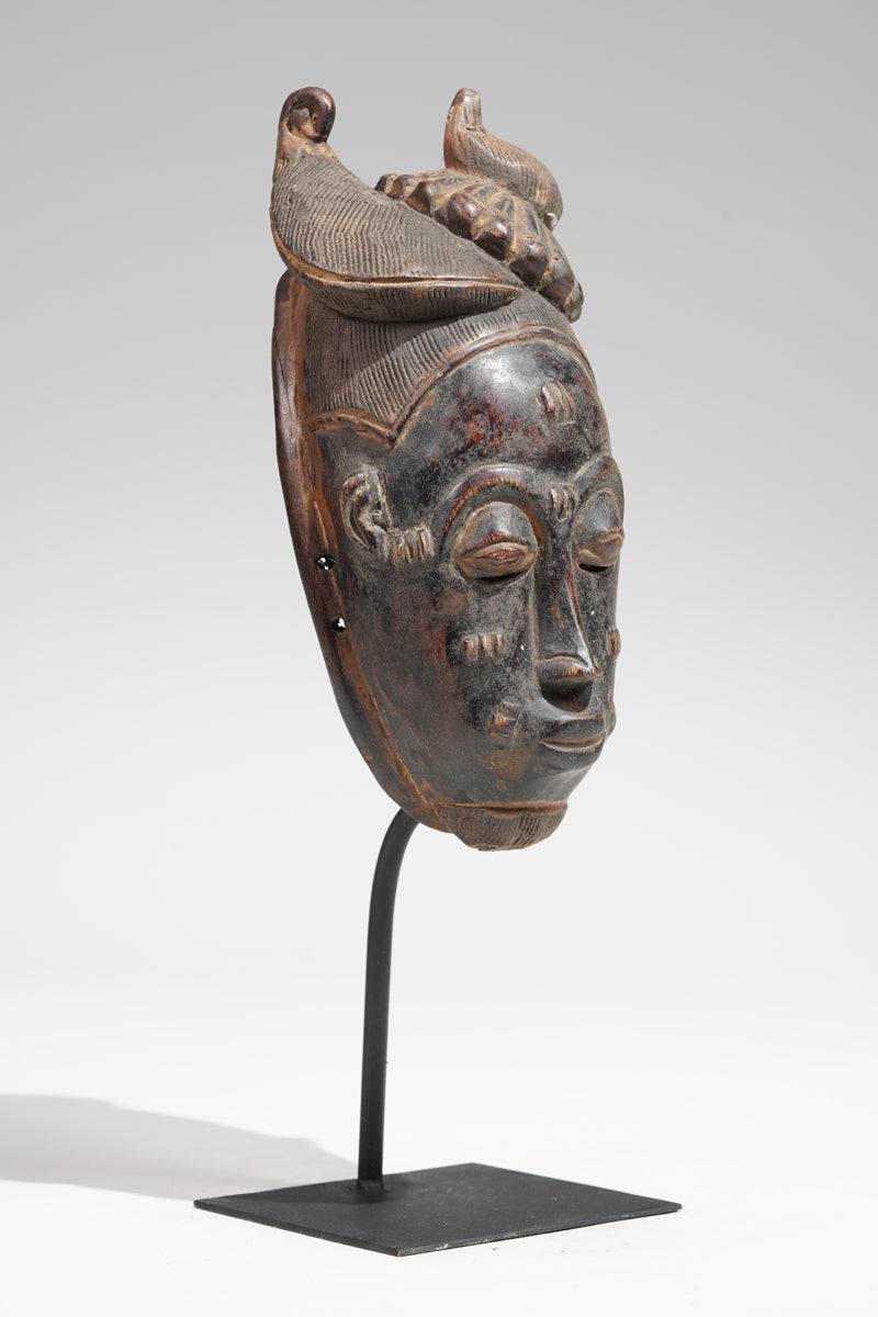 A Baule mask, collected in the Sakassou region