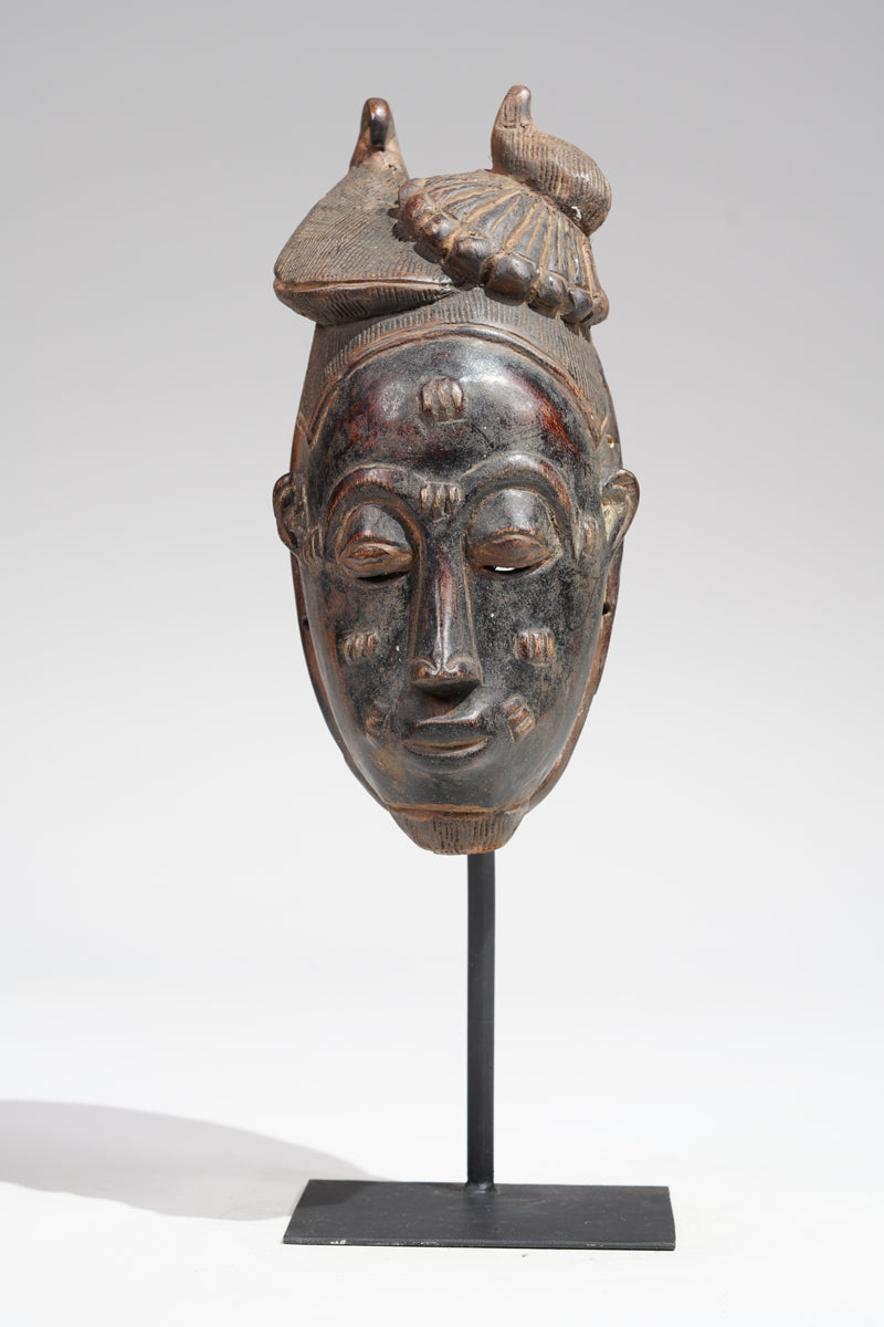 A Baule mask, collected in the Sakassou region