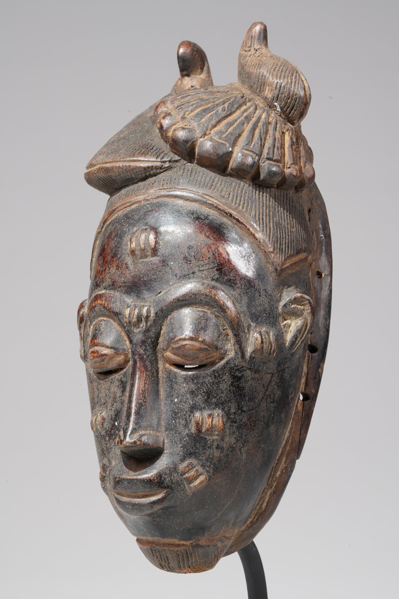 A Baule mask, collected in the Sakassou region