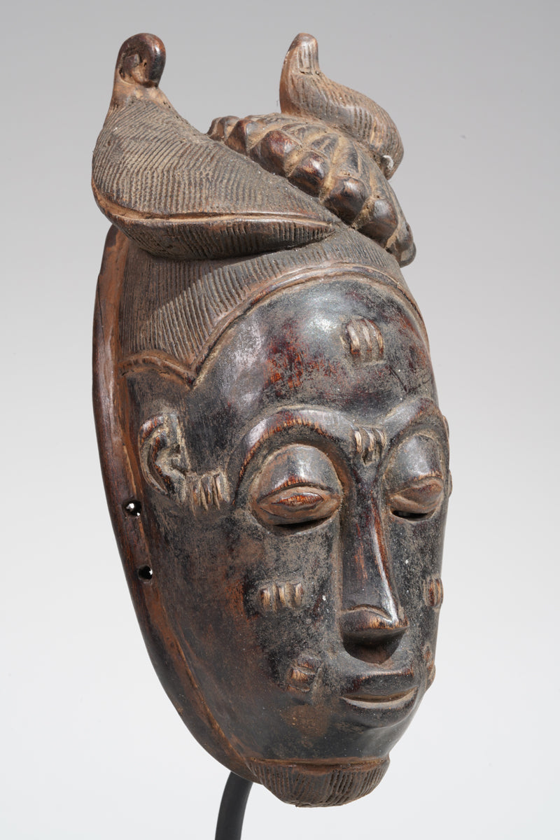 A Baule mask, collected in the Sakassou region